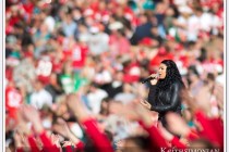American Idol winner Jordon Sparks is surrounded by a sea of red and gold at 49ers vs Miami halftime show