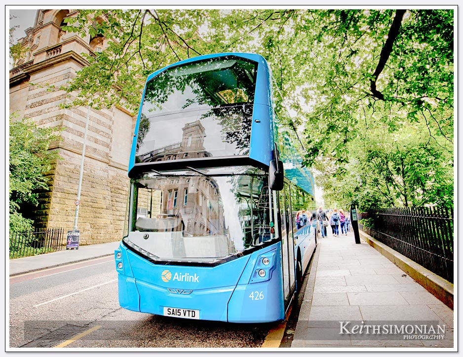 Reflection in blue bus - Edinburgh Scotland