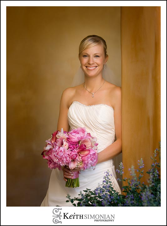 The architecture of the Nicholson Ranch Winery is used for a bridal portrait.
