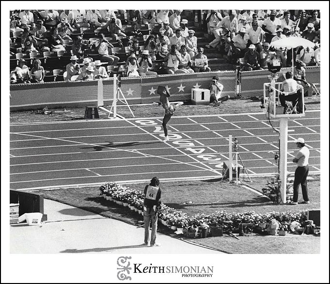 Anchoring the 4 x 100 meter relay, Carl Lewis wins his 4th gold medal of the 1984 Summer games