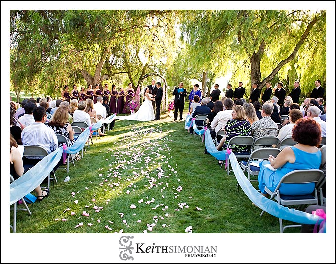 Pepper trees provide shade during wedding ceremony at Discovery Bay