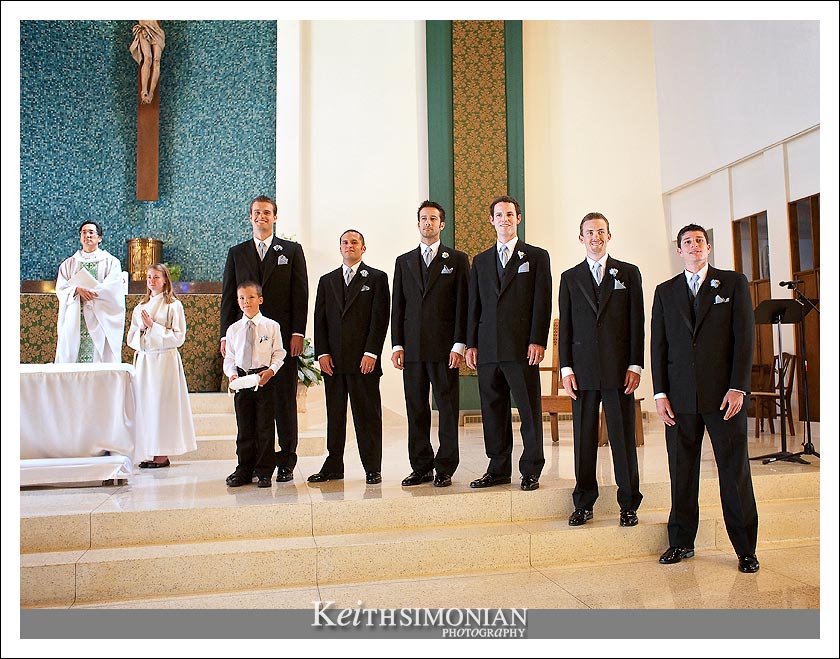The groomsmen and best man wait for the bride