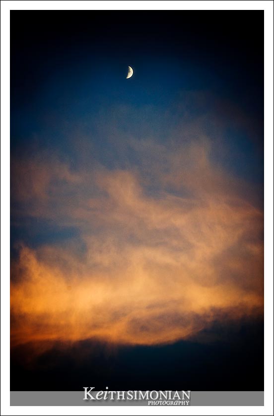 Crescent moon rise over late October sky photo