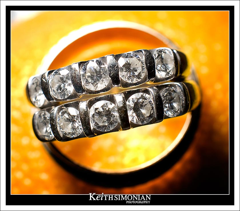 A lemon, 2 wedding rings, and 2 carats of diamonds