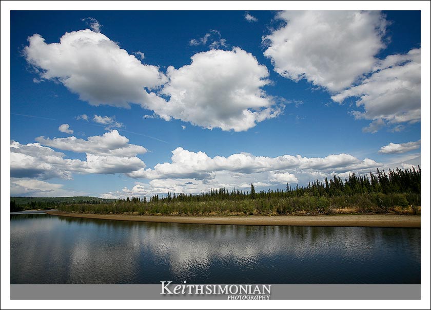 Clouds an river - Fairbanks Alaska View from the paddle wheeled Riverboat Discovery which travels both the Chena and Tanana Rivers.