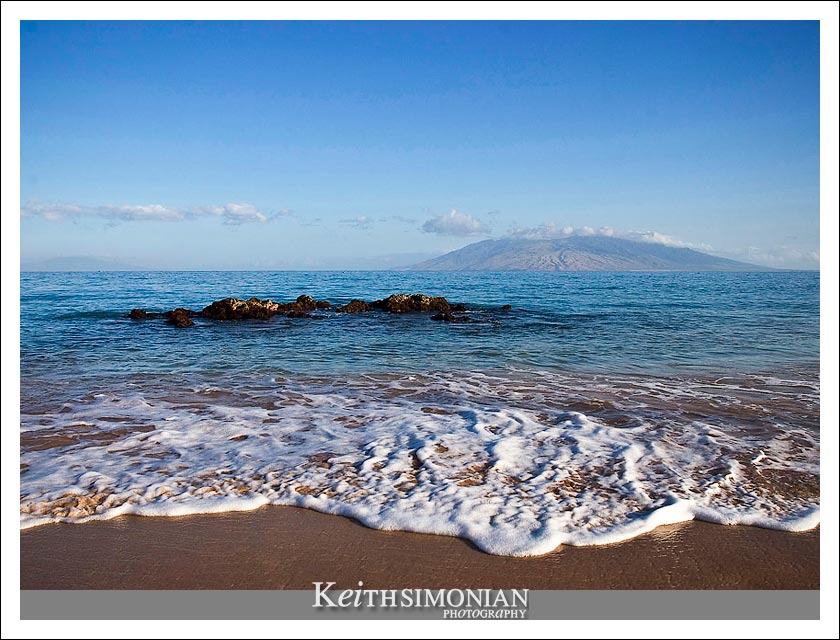 17-May-2005: Maui, Hawaii. The ocean waters rush in along along the beach in Maui.