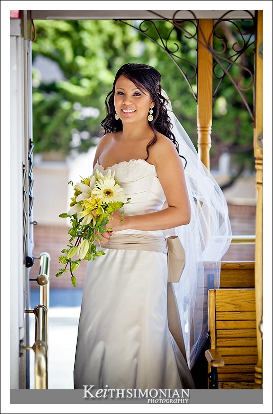 Bridal portrait aboard a motorized cable car in San Francisco, CA