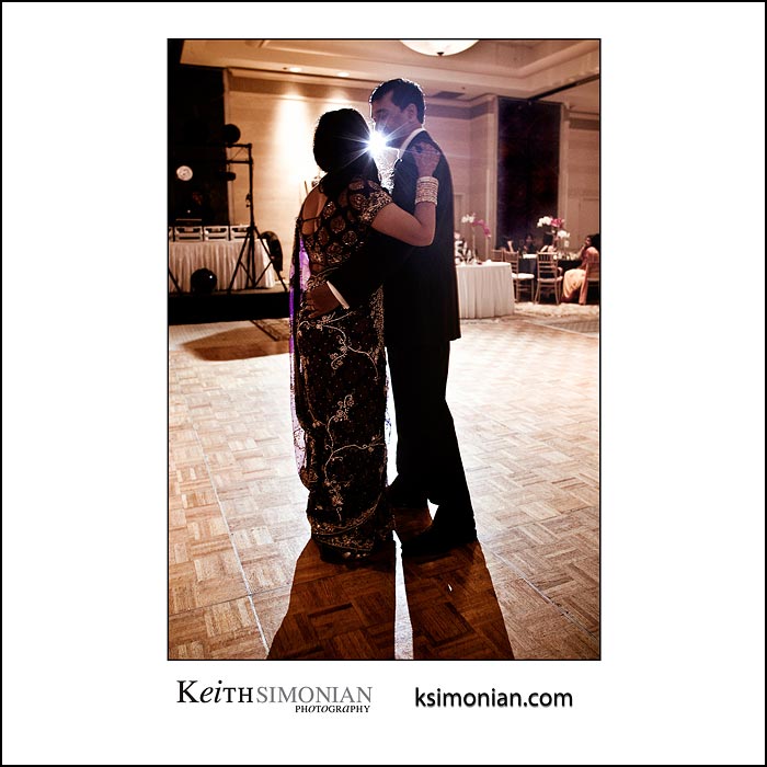 Bride and groom dancing during the reception at the Fremont/Newark Hilton Hotel