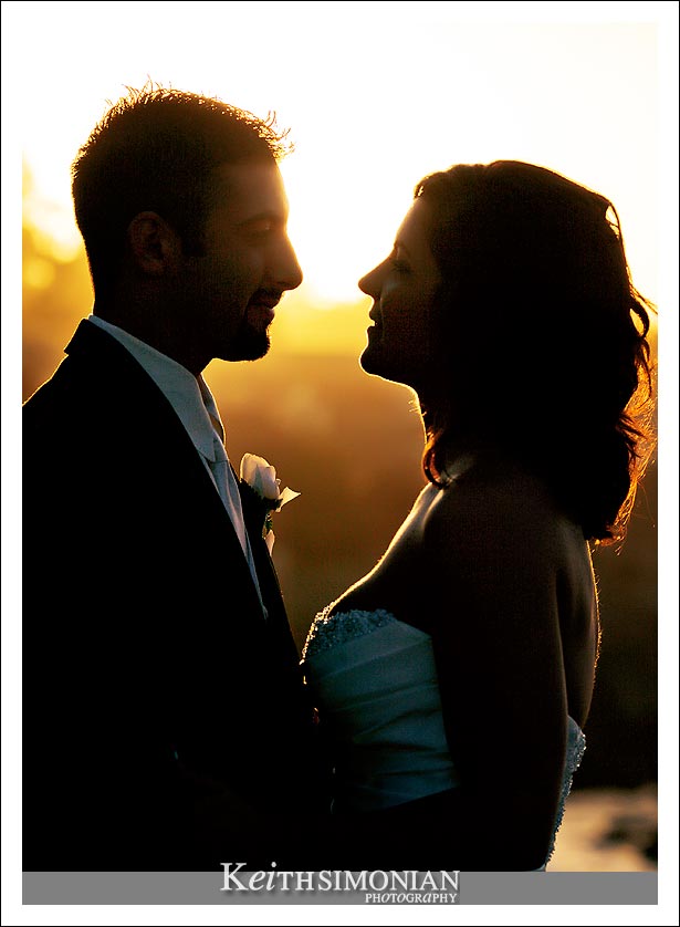 Sunset photo of the bride and groom at Lovers Point in Pacific Grove, California
