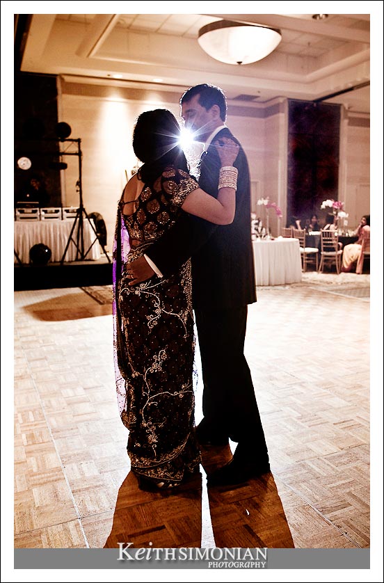 Photo of bride and groom during their first dance as husband and wife.