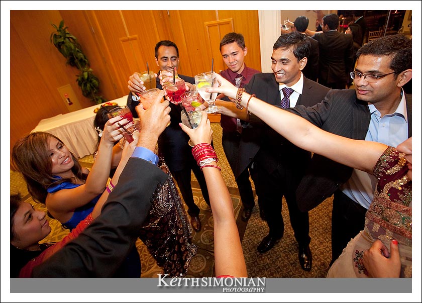 A toast to the bride and groom with friends