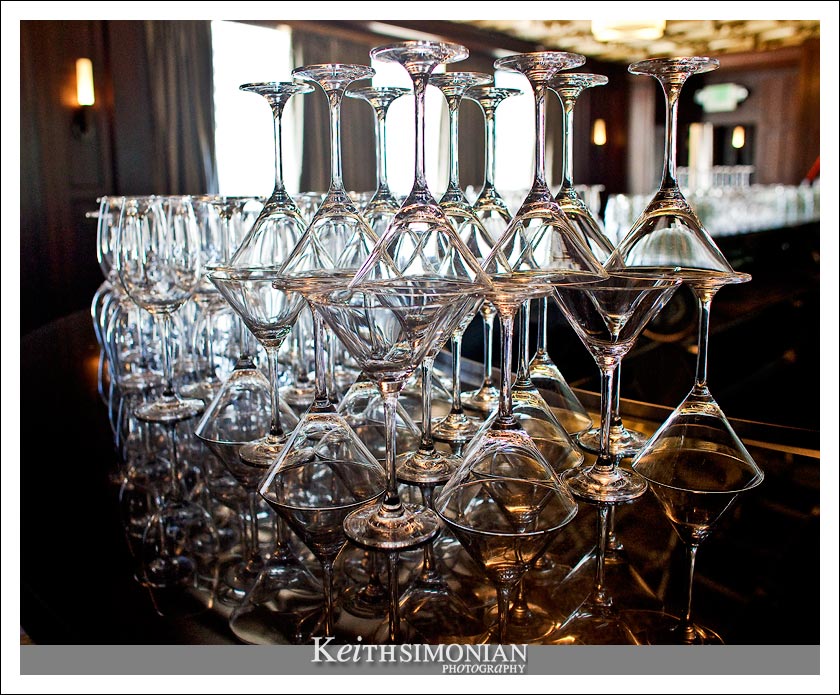 Martini glasses  and their reflections at the Julia Morgan Ballroom in Merchants Exchange building in San Francisco