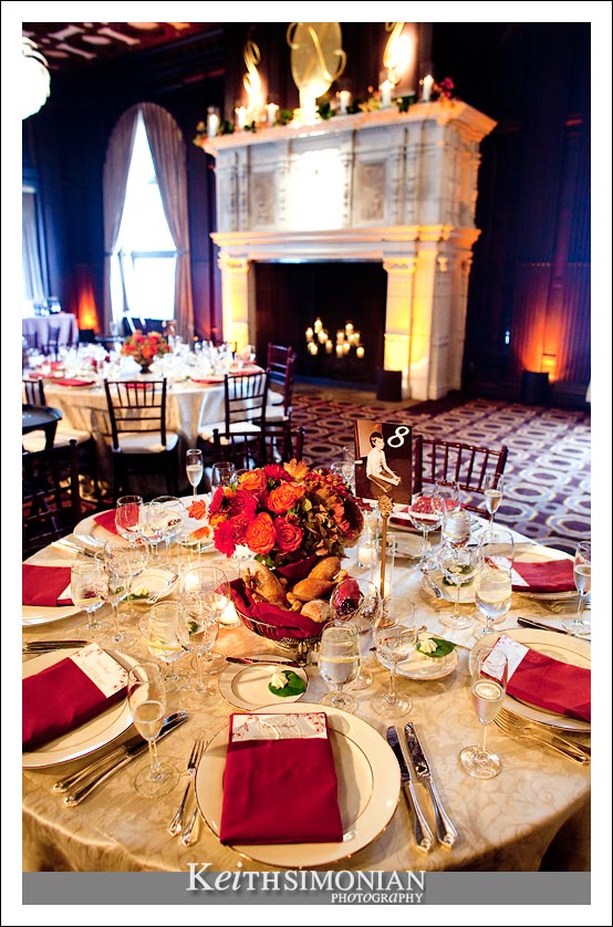 Photo of table setting and fireplace in the Julia Morgan ballroom in San Francisco, California