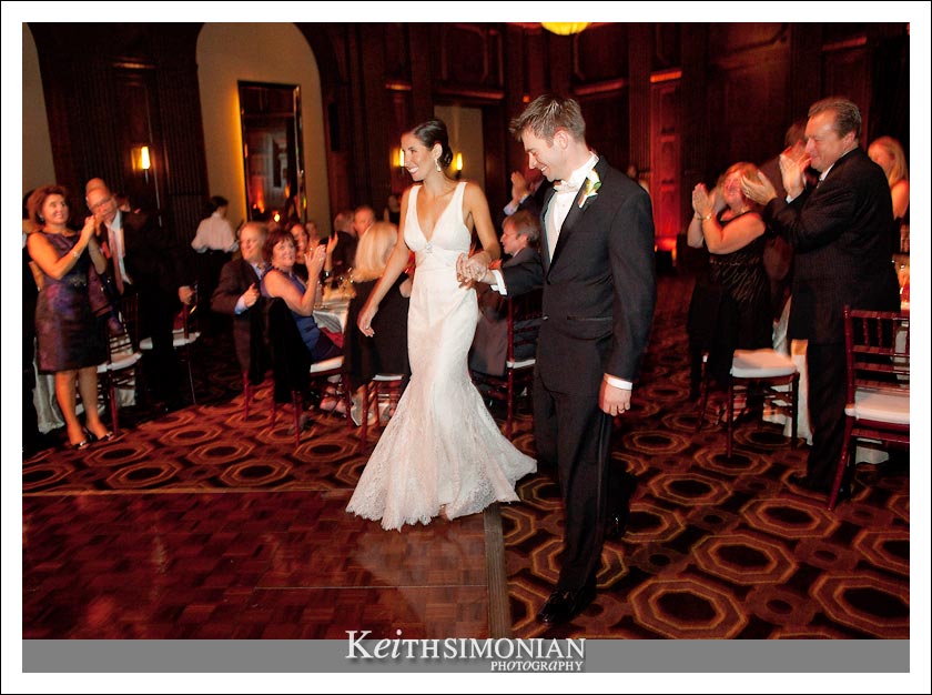 The couple enter the ballroom and are announced to their guests