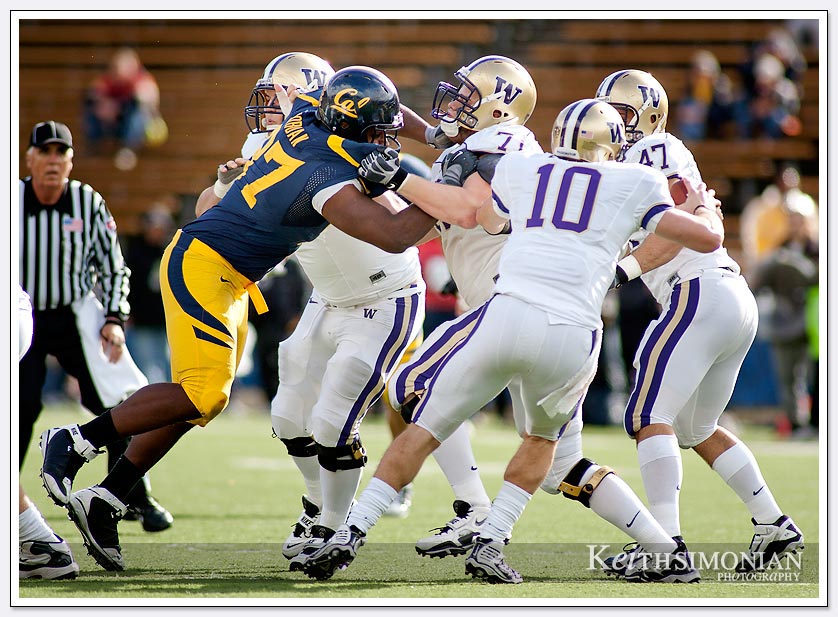Cal's defensive lineman #97 Cameron Jordan tries to chase down Washington quarterback Jake Locker
