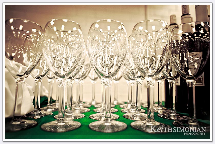Wine glasses lined up for the reception guests