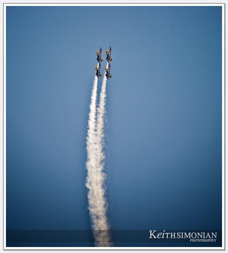 Four Blue Angel jets going vertical