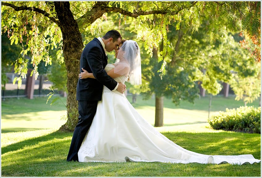The back lite trees provide shade for the bride and groom