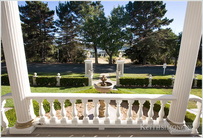 White railing and fountain picture at Jefferson Street Mansion
