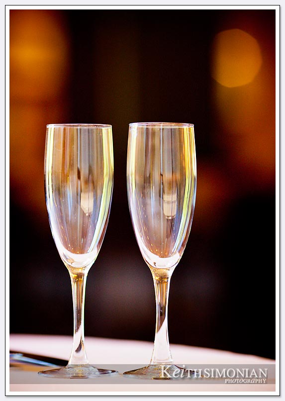 Two Champagne glasses photographed with shallow depth of field