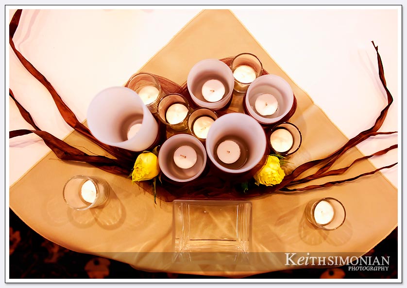 Many different size candles create a table decoration