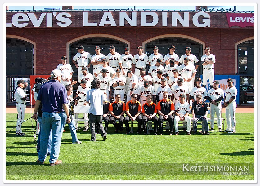 Players, coaches, and staff get ready for the San Francisco Giants 2012 Team picture