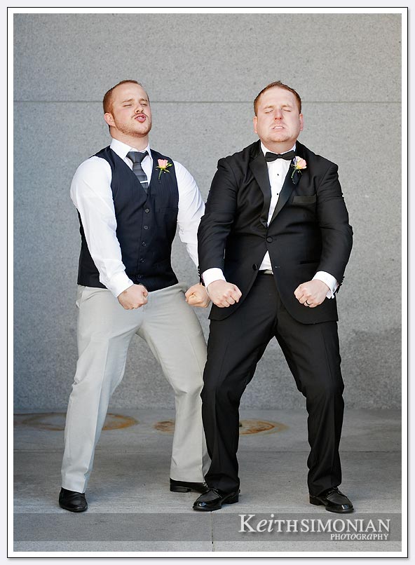 The groom and one of his groomsmen ham it up for the photographer