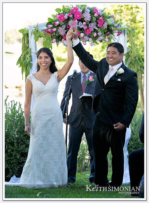 The bride and groom celebrate as husband and wife at The Lakes at El Segundo