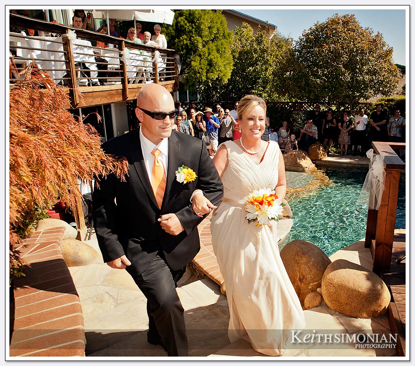With a backyard wedding you can have great views with family and friends poolside to enjoy the ceremony.