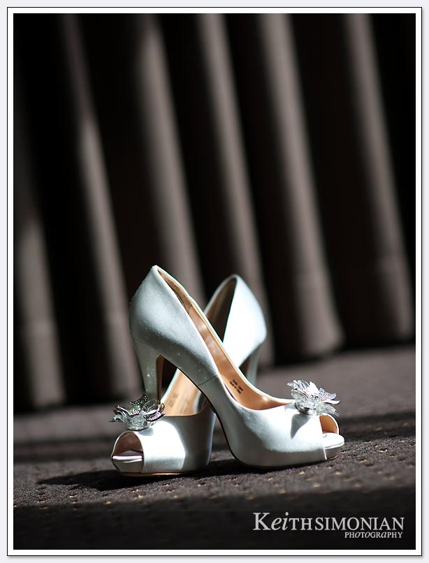 Interesting angle showing bride's shoes against curtain at the Le Meridien Hotel in San Francisco