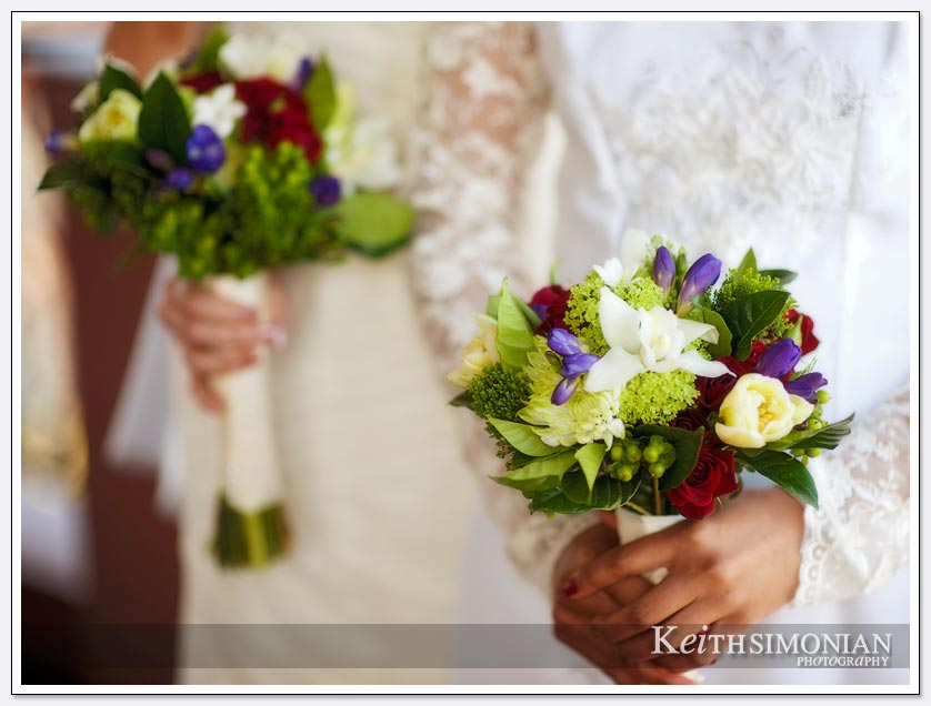 The bouquets are made up of red, yellow, purple and blue flowers