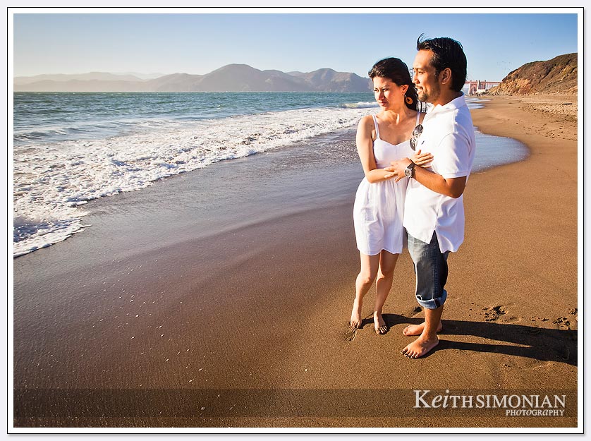 The waves of the Pacific Ocean crash on Baker Beach - San-Francisco-Engagement-Photos