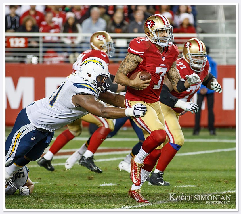 Canon-7D-Mark-II-NFL-Game - San Francisco 49er quarterback Colin Kaepernick scores a 90 yard touchdown which is the 2nd longest in NFL history. 