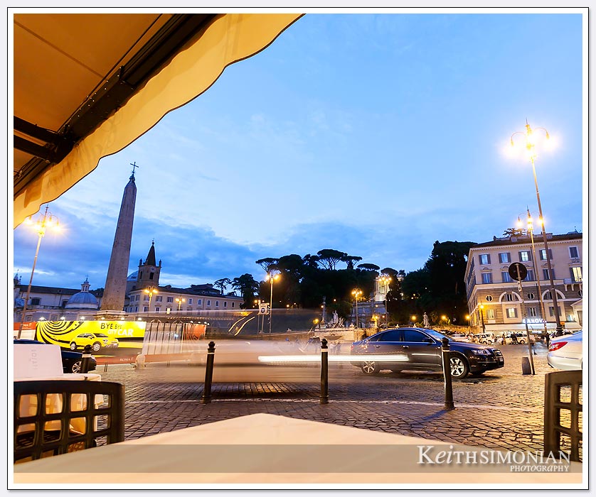 Night view from an outdoor cafe at the Piazza del Popolo