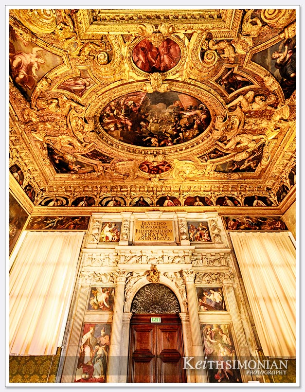 Gold and paintings on the walls and ceilings of Doge's Palace - Venice Italy