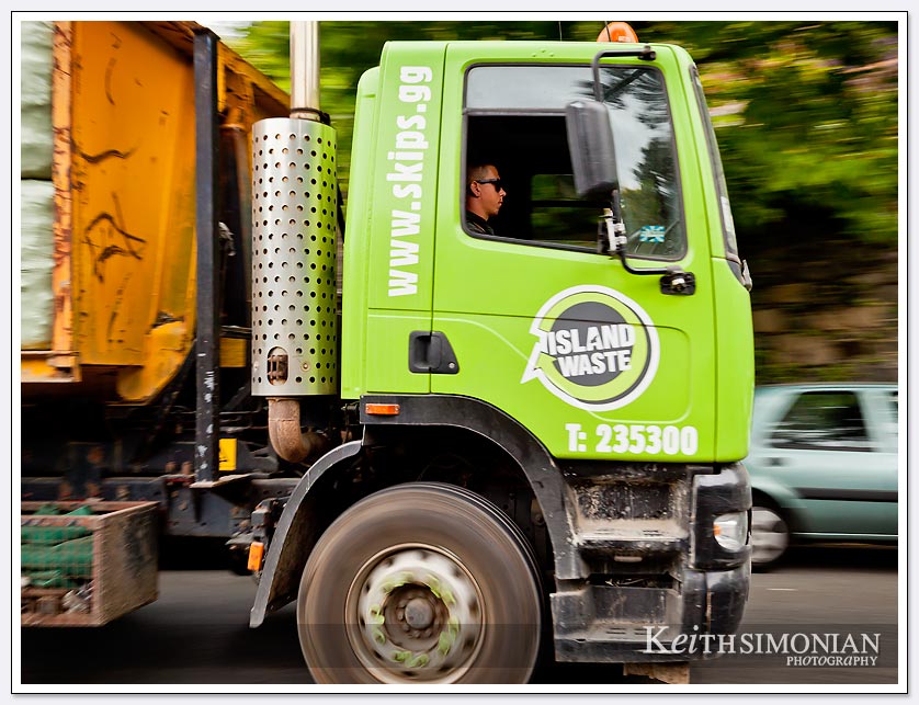 Island waste truck speeding through Guernsey UK.