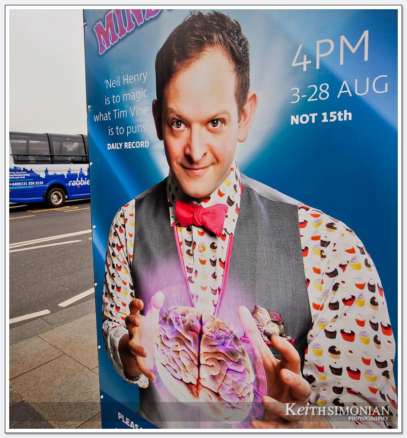 Sidewalk ad for a magician in Edinburgh Scotland