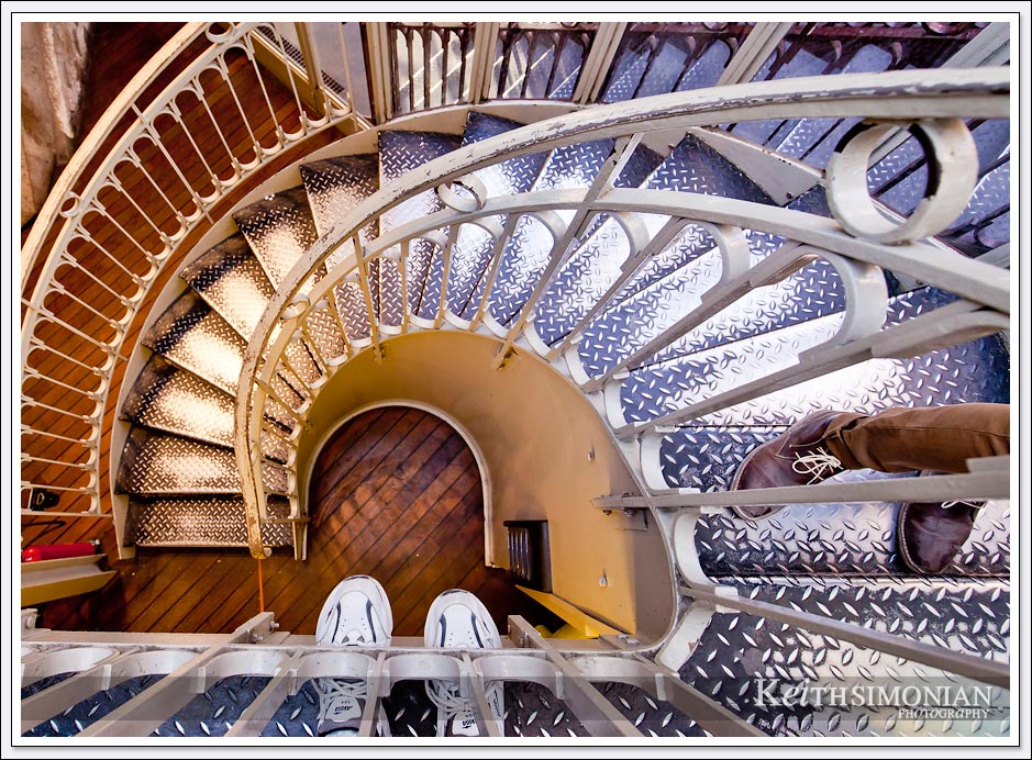 Stairs which allow you to climb to the top of the Eiffel Tower in Paris France. I would suggest taking the elevator