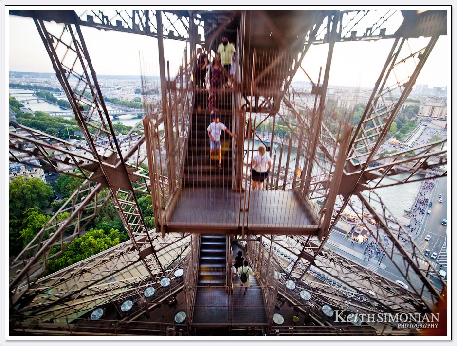 Taking the elevator down from the top of the Eiffel tower one sees that stairs the also take visitors to ground level - Paris France