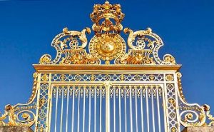 The restored Gold Leaf adorns the main gate to the Palace of Versailles in France