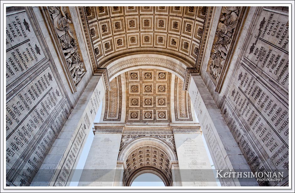 The Arc de Triomphe serves a memorial to French military victories - Paris France