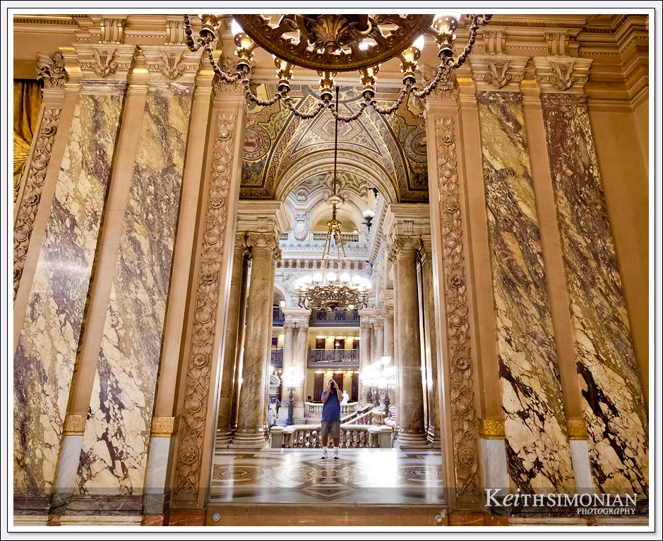 Photographer's reflection in the mirror of the Palais Garnier - Paris France