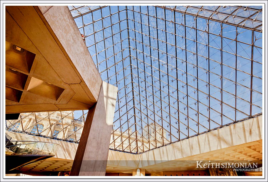 One enters the Louvre through the glass pyramid in the courtyard - Paris France