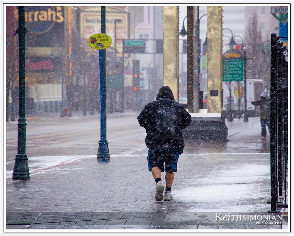 Snowfall in Reno Nevada with local wearing shorts and jacket.