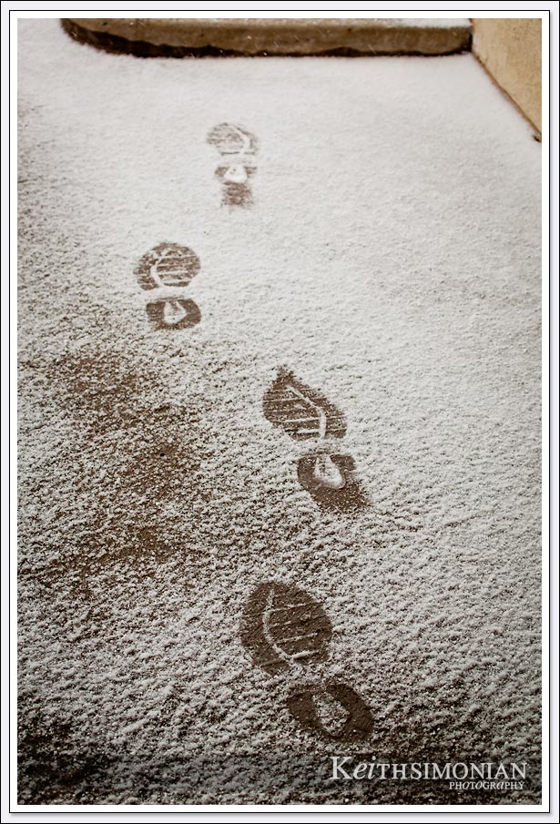 Tennis shoe foot prints in fresh snow - Reno Nevada.