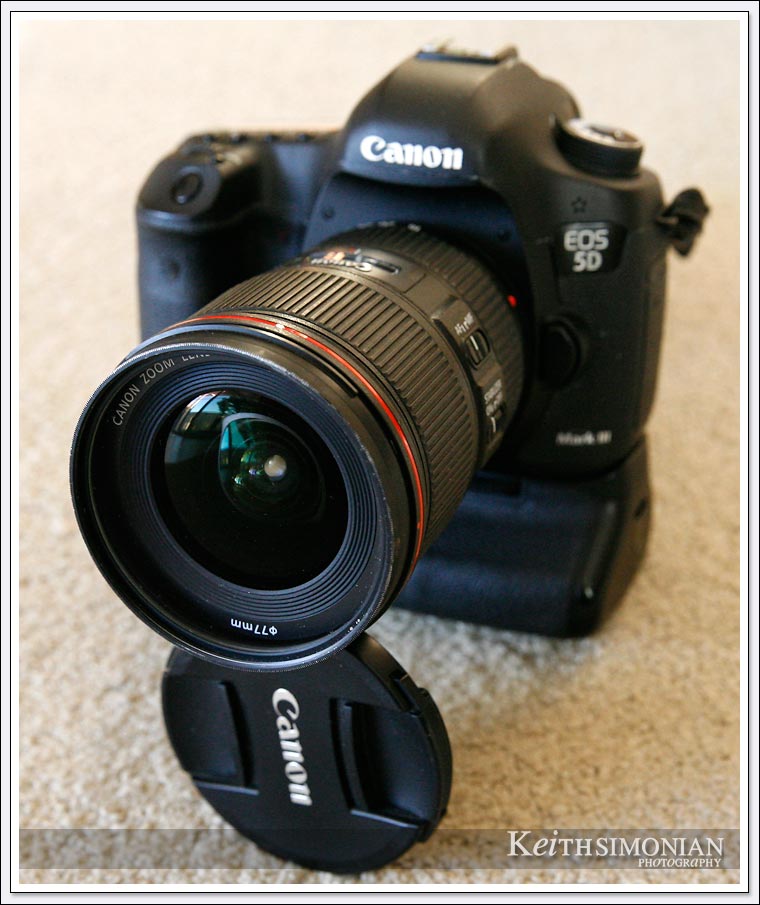 The lens cap of the Canon 16mm to 35mm zoom works as an on the go tripod for long exposure photos. 