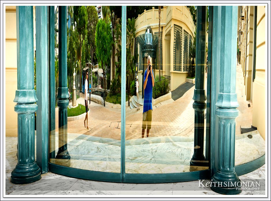 Nothing says tourist like taking a photo of your reflection in the window of an expensive shop in Monte Carlo.