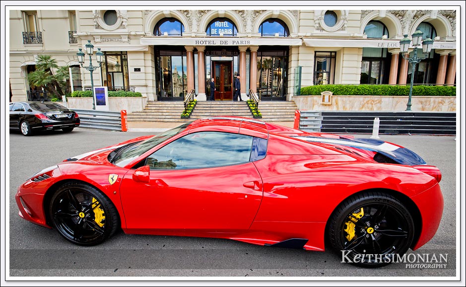 This red Ferrari is parked in front of the Hotel de Paris in Monte Carlo.