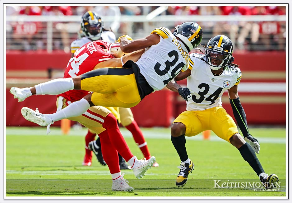 Pittsburgh Steeler #39 Minkah Fitzpatrick leaps by San Francisco 49ers fullback #44 Kyle Juszczyk at Levi's Stadium - September 22, 2019
