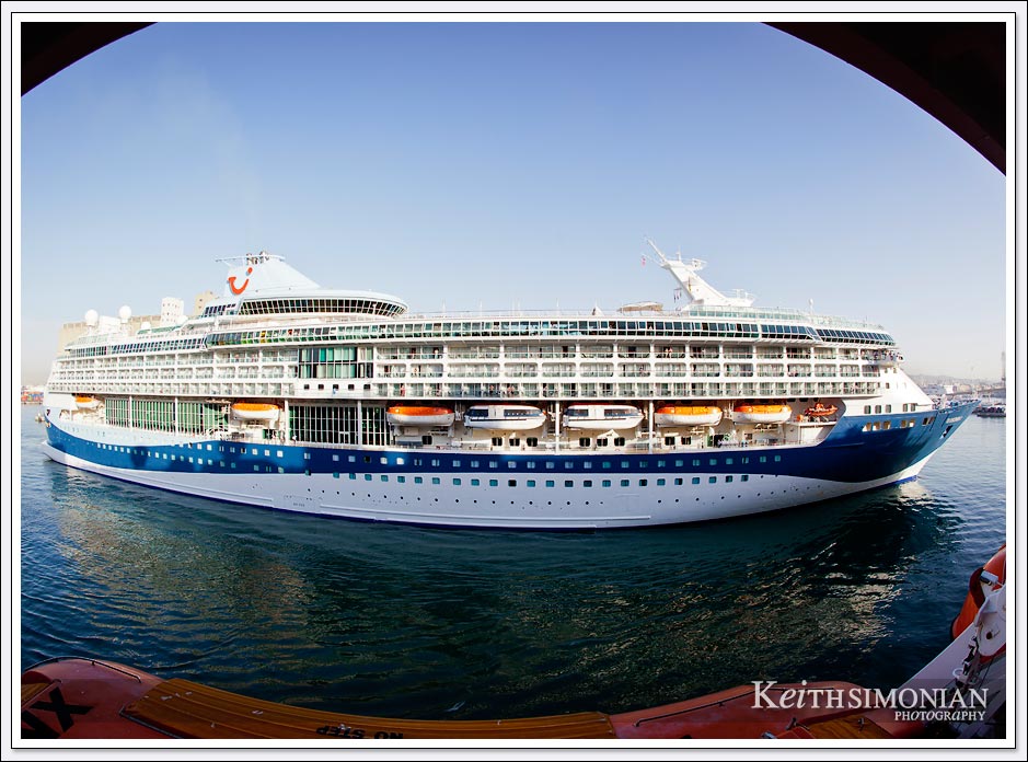 Fisheye view of cruise ship passing by into port - Barcelona Spain